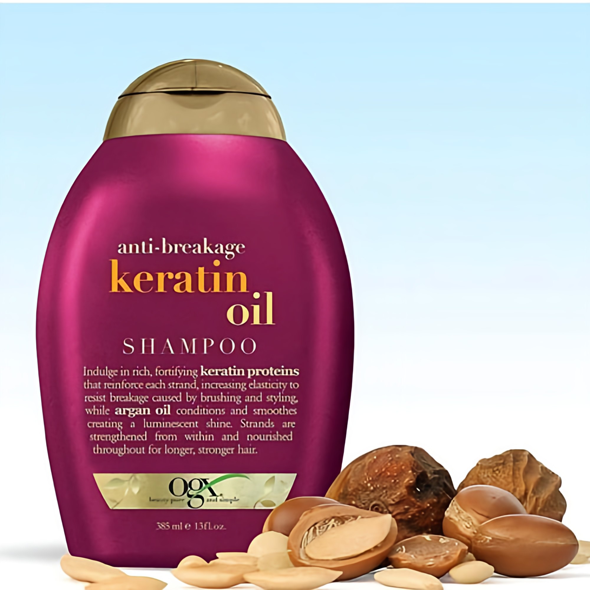 شامپو OGX مدل Renewing + Keratin Oil – قرمز (تقویت‌کننده با کراتین)
